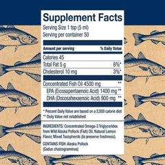 Pouring Wiley's Finest omega-3 liquid for daily use