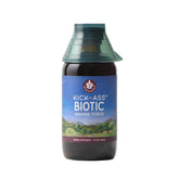 WishGarden Kick-Ass Biotic bottle being poured for quick immune support