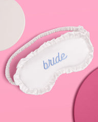 xo, Fetti embroidered blue bride detail highlights bridal look.