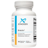 Xymogen B Activ bottle cap on a clean surface, ready for daily use.