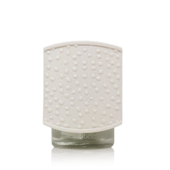 Yankee Candle Sprinkle Dots ScentPlug diffuser base elevates ambiance with warm fragrance.