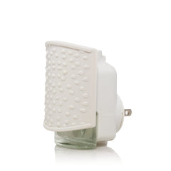Yankee Candle Sprinkle Dots ScentPlug diffuser unit provides continuous scent across rooms.