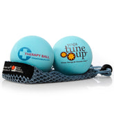 Yoga Tune Up therapy balls in tote for targeted muscle release on the go.