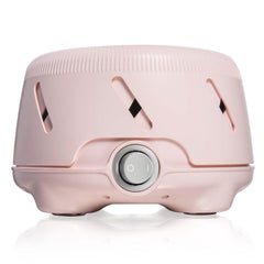 Yogasleep Dohm Uno on nightstand delivering gentle pink noise for restful sleep