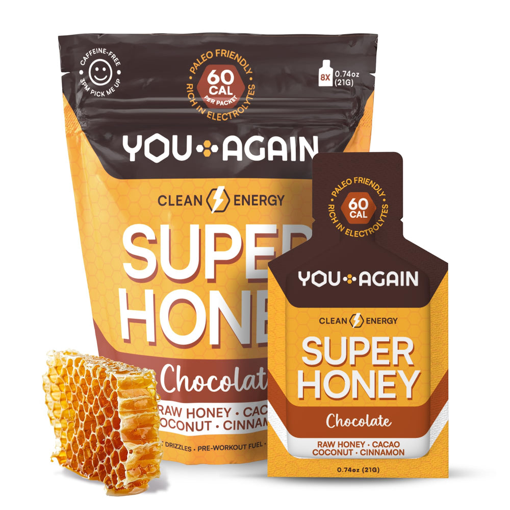 You Again Super Honey Chocolate packet in hand for fast, caffeine-free energy.