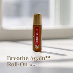 Young Living Breathe Again bottle close-up showing Copaiba and Peppermint notes.