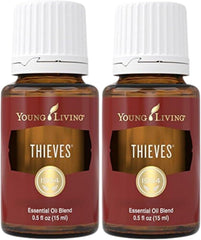 Young Living Thieves 15ml rosemary bottle releasing a warm aroma for diffusing sessions