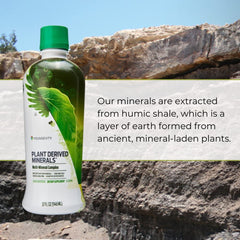 Youngevity Plant Derived Liquid Minerals being poured for easy incorporation into beverages