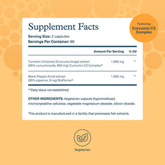 Youtheory Turmeric Extra Strength 1000 mg capsules close-up showing vegetarian capsules for easy daily use.