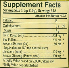Powdered spoon dispensing YS Royal Jelly in Honey Ult Strength gel for convenient use.