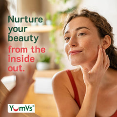 YUM-V'S Biotin Gummies product shot with raspberries highlights tasty daily nutrition.