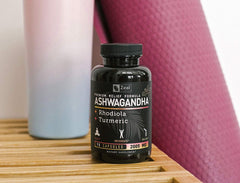 Capsules being poured from Zeal Naturals Ashwagandha Complex bottle for easy daily use