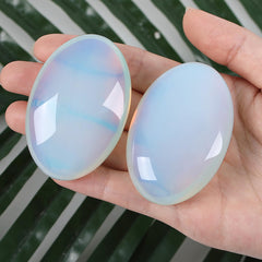 ZHIYUXI Opalite palm stone close-up highlighting polished surface and balance
