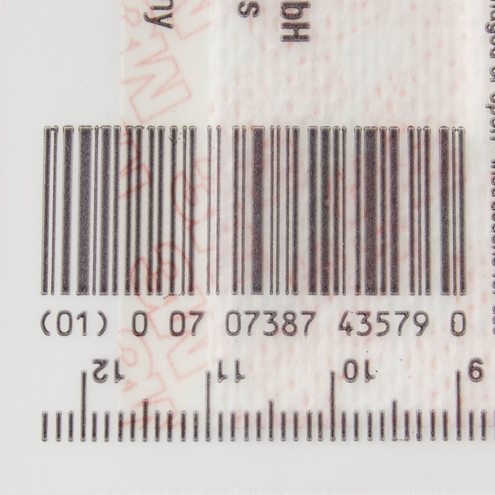 3M Medipore dressing applied to arm demonstrating conforming fit.