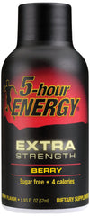 Pouring Five-hour Energy Extra Strength Berry shot for an on-the-go boost.