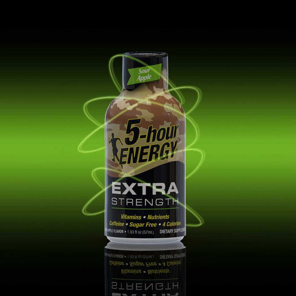 5-hour ENERGY Sour Apple Shot pour captured mid-use