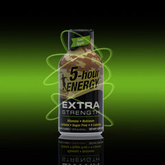 5-hour ENERGY Sour Apple Shot pour captured mid-use