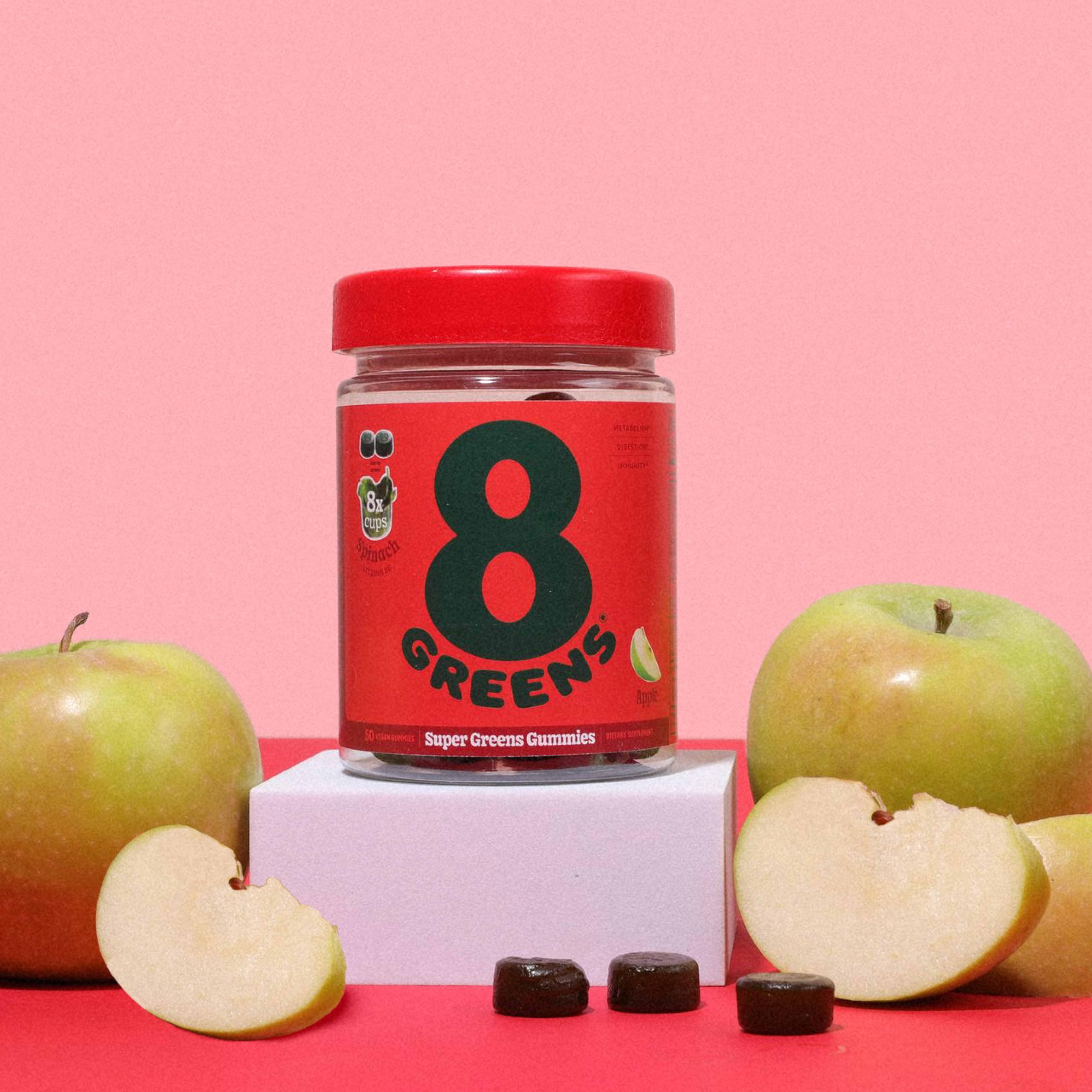 Store shelf with 8Greens Daily Greens Gummies Apple packaging.