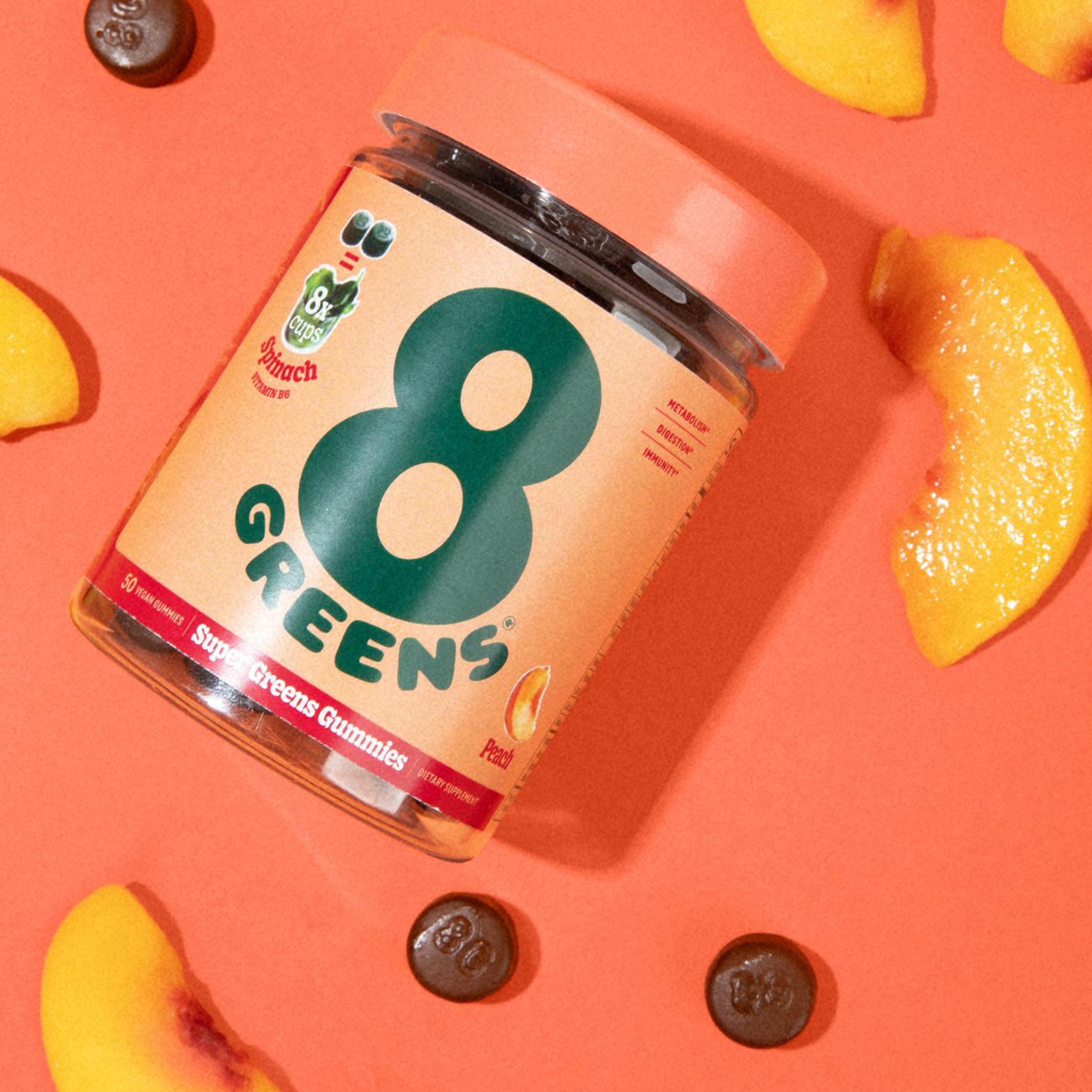 8Greens Supergreens Gummies on table with water, easy supplementation.