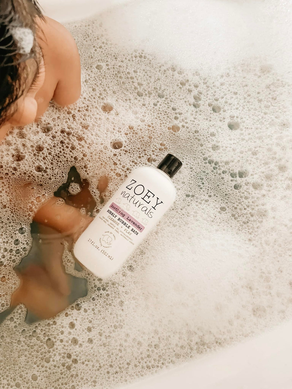 Zoey Naturals aloe and oil close-up suggests soothing hydration for sensitive skin.