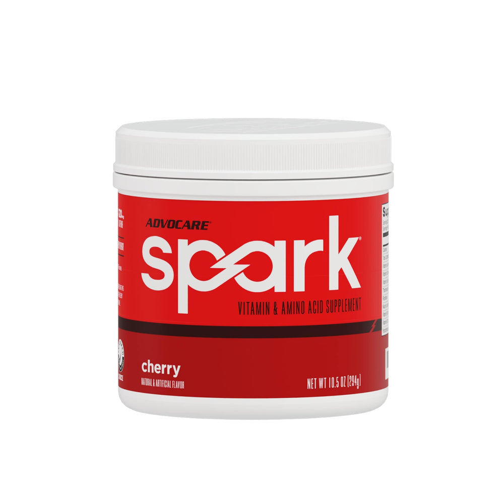 AdvoCare Spark cherry powder tub pour for on-the-go energy.