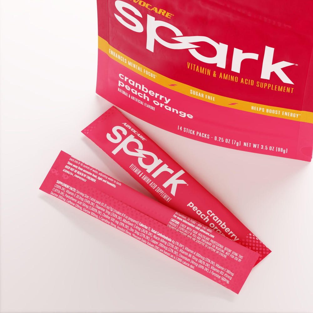 AdvoCare Spark dissolving powder in water demonstrates quick drink for alertness.