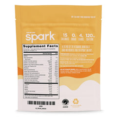 Advocare Spark orange-cream-float pack on desk ready for a boost.