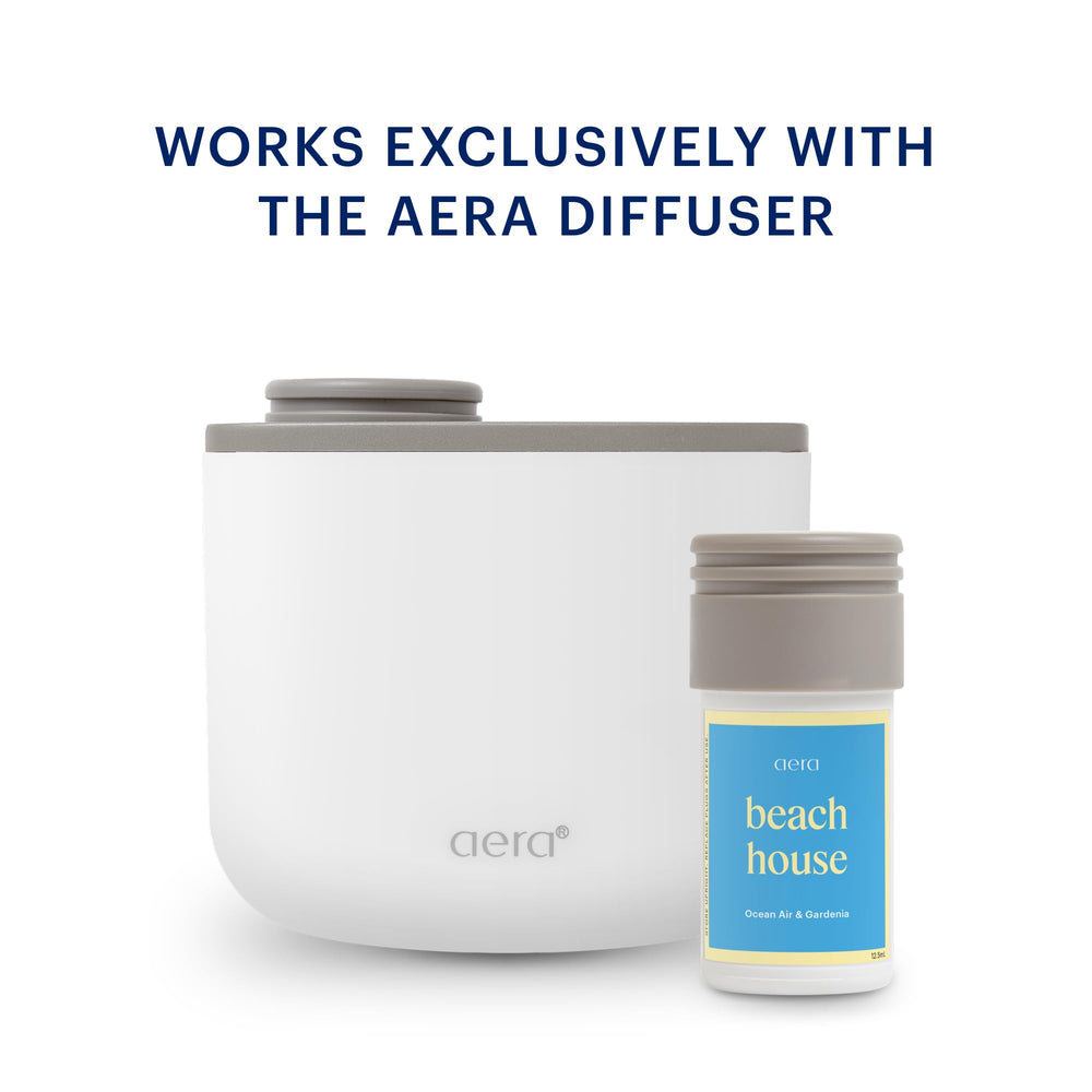 Aera Mini Beach House ocean air gardenia notes on label for summer ambiance.