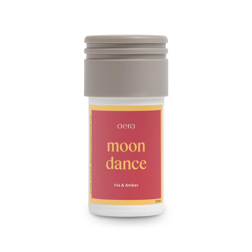Aera Mini Moondance diffuser in room creates a luxurious ambience.