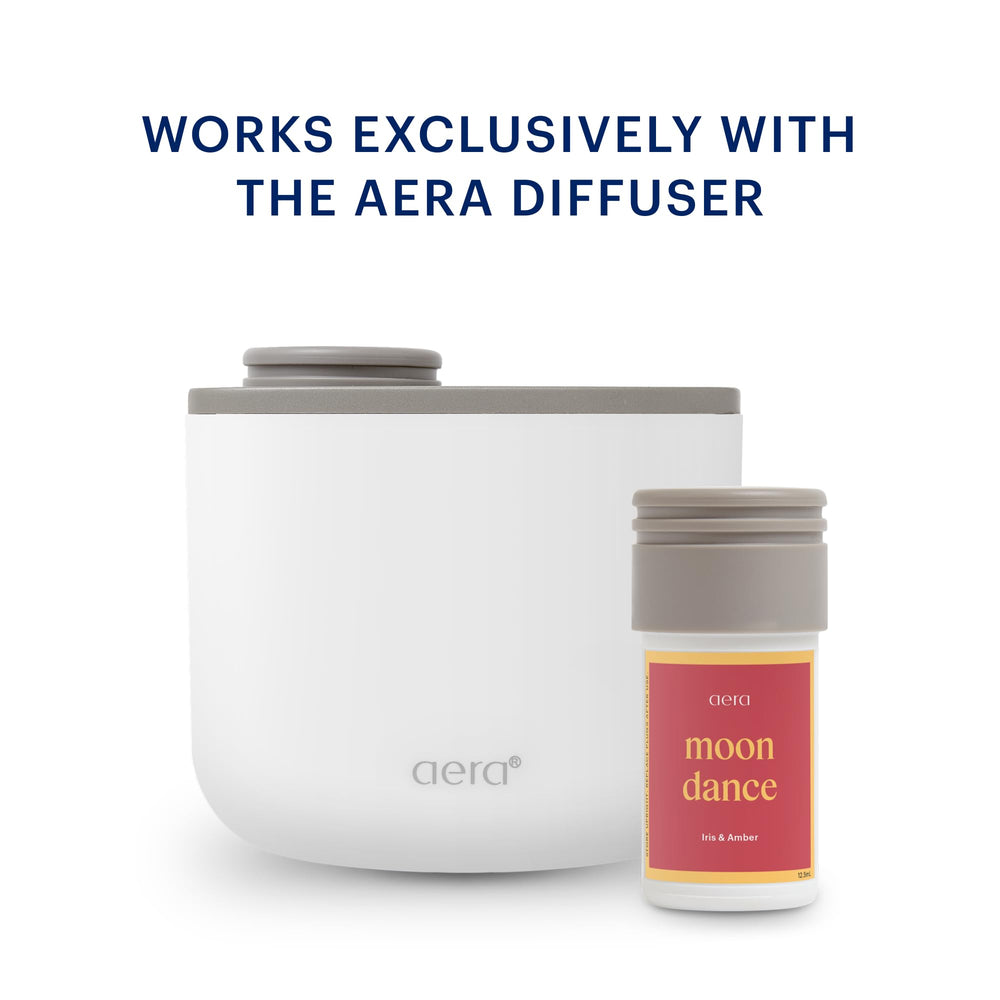 Aera Mini Moondance guaiac wood touch deepens luxury and depth.