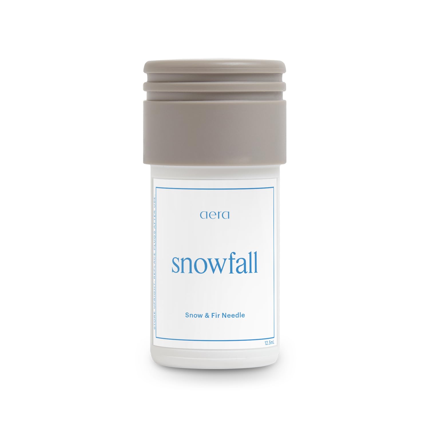 Aera Mini Snowfall bottle pour shows clean design and easy refill for fresh winter notes