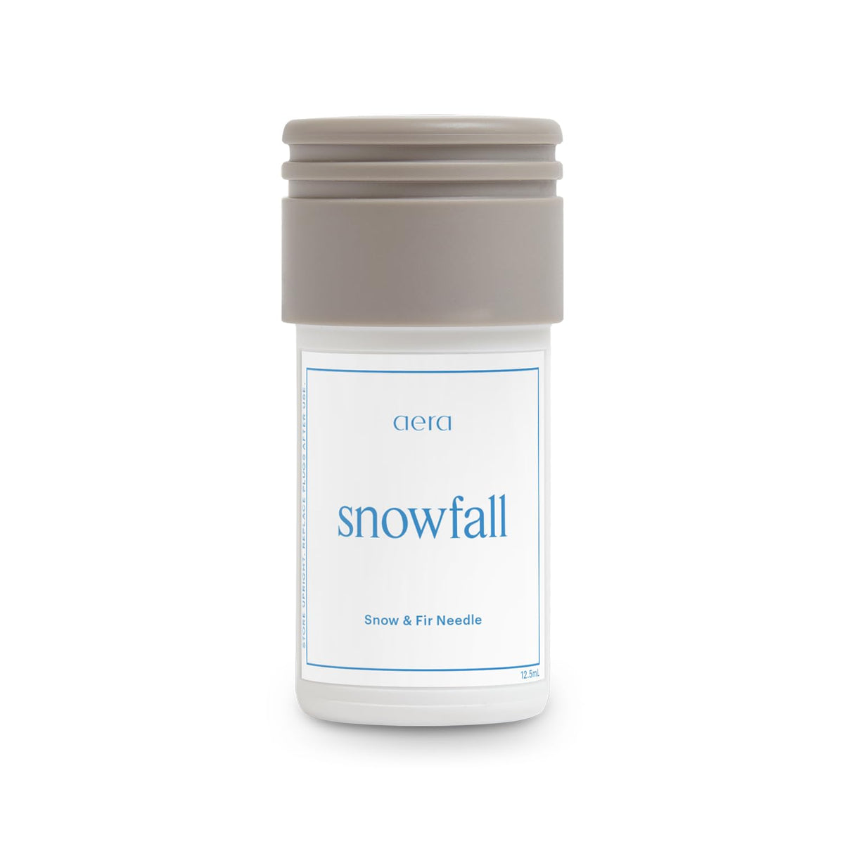 Aera Mini Snowfall bottle pour shows clean design and easy refill for fresh winter notes