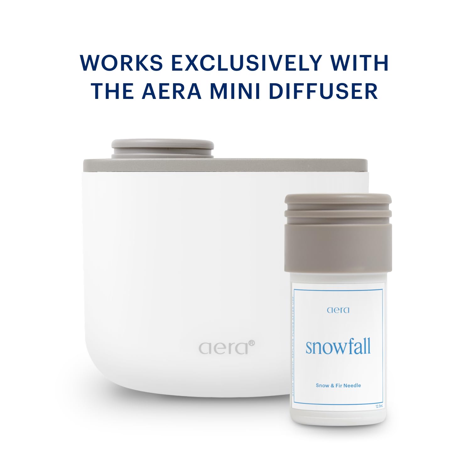 Aera Mini Snowfall fragrance notes image showcases cedarwood and fir needle blend