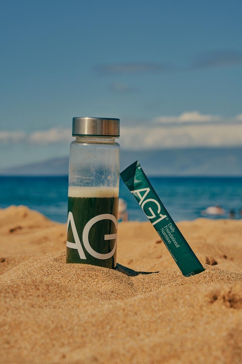 AG1 bottle beside a balanced daily routine setup.