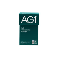 AG1 classic formula powder scoop for daily nutrition and gut support.