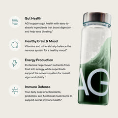 AG1 pineapple-vanilla flavored shake in glass, refreshing taste.