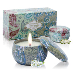AGOL Candles two-pack tin set with gardenia and jasmine scents for relaxation.