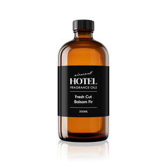 Air-Scent Fresh Cut Balsam Fir diffuser oil bottle for elevating festive spaces.