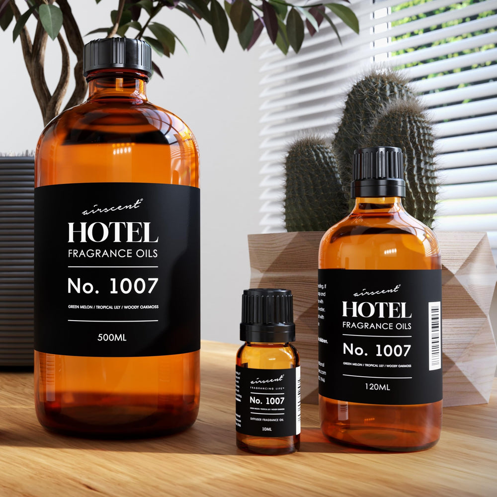 Pouring the Air-Scent No.1007 oil into a diffuser for easy setup