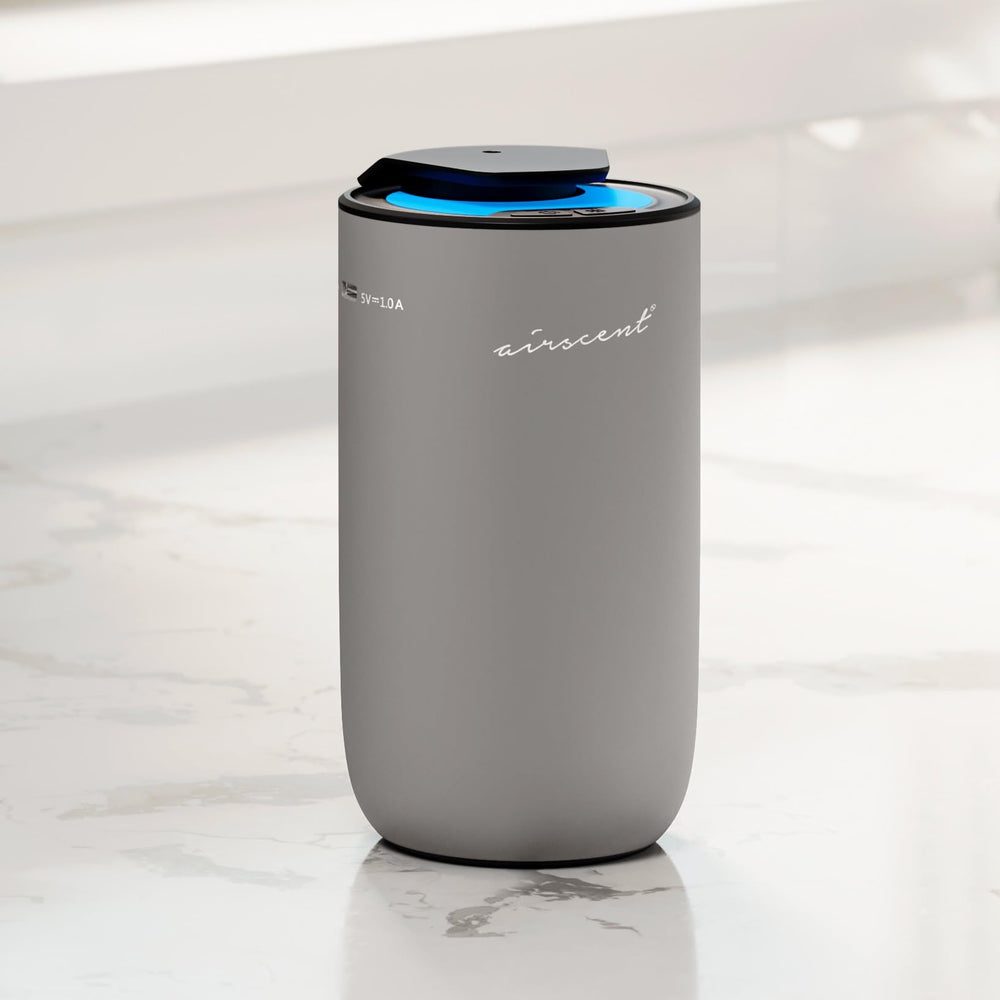 Air-Scent Mini Waterless Diffuser showing ambient LED color cycle for mood lighting.