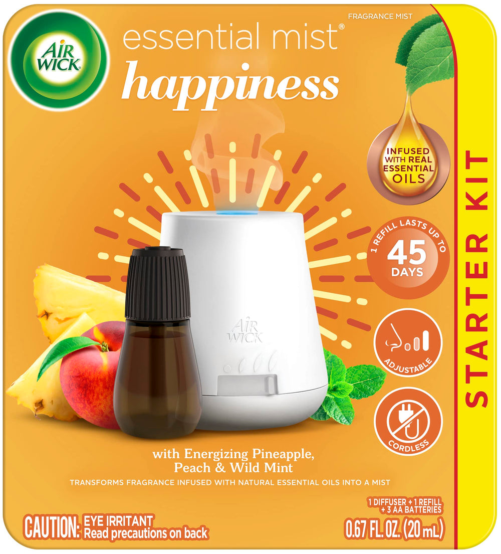 Air Wick Essential Mist Joy diffuser in a living room delivering a soft aroma