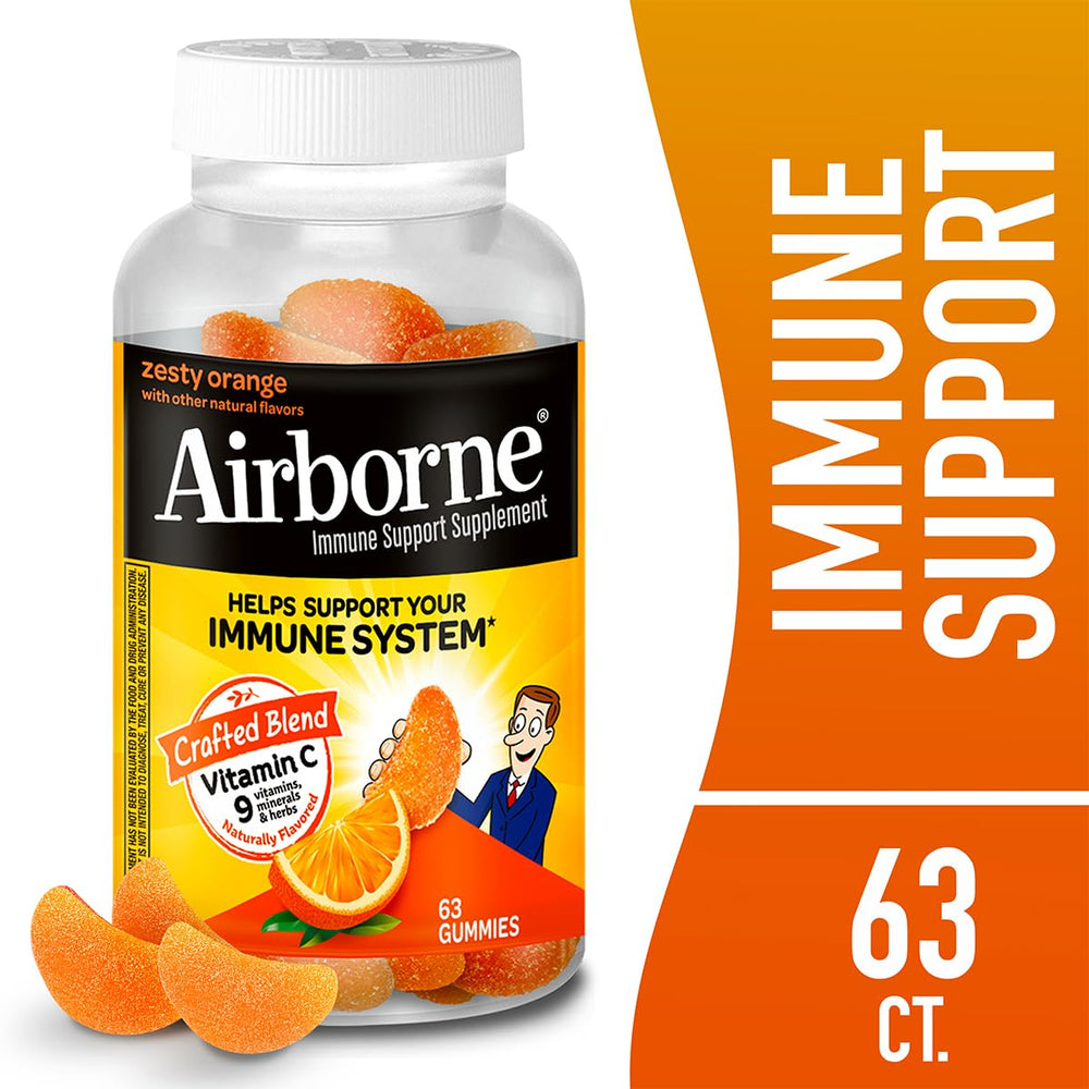 Airborne gummies in hand, ready for on-the-go daily vitamin boost.