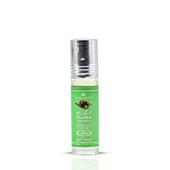 Al-Rehab Choco Musk Pistachio roll-on applying for portable fragrance on the go.