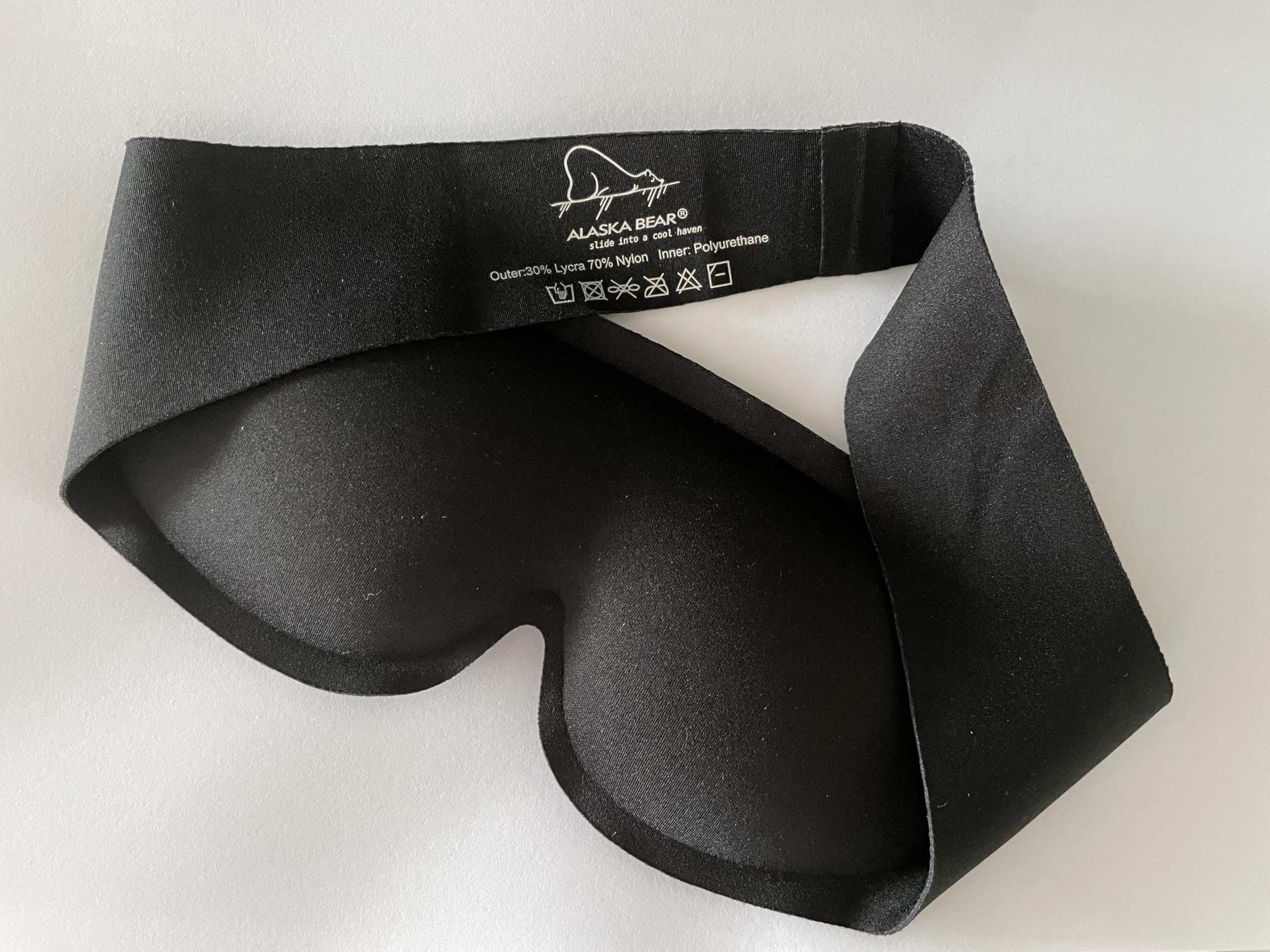 Mascarilla Alaska Bear para viajes y vuelos nocturnos con oscuridad suave.