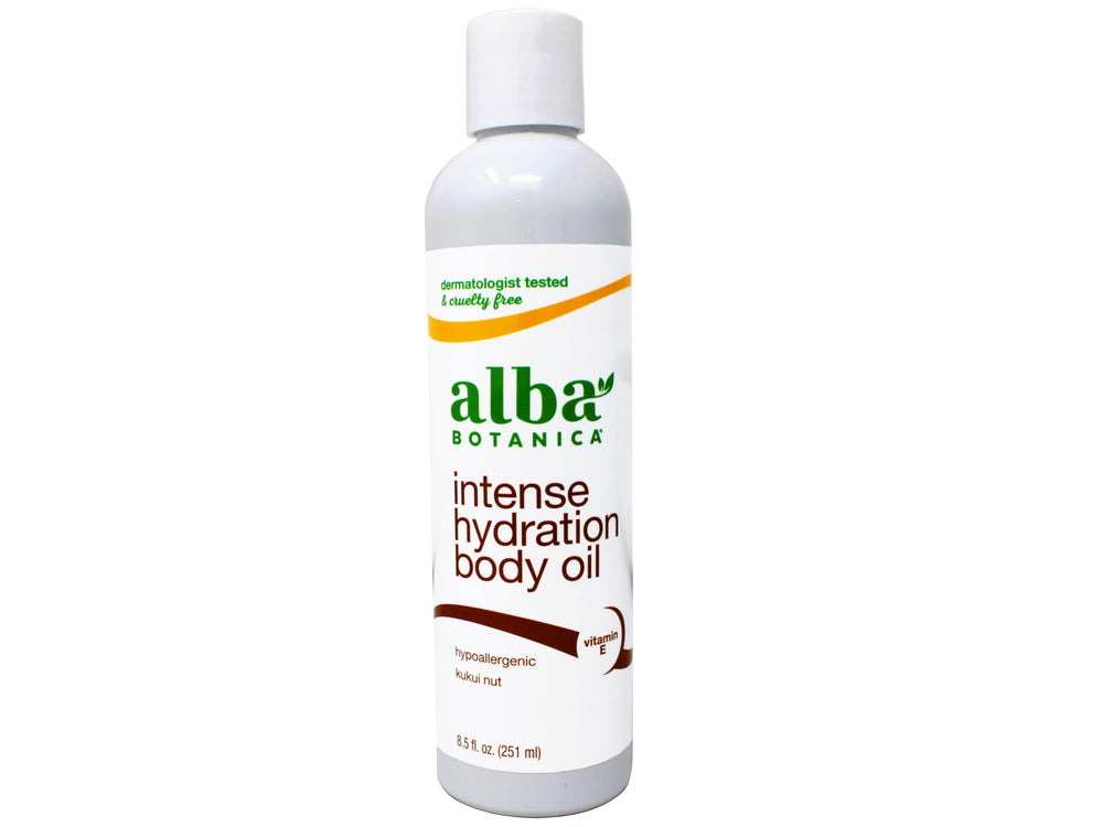Alba Botanica Kukui Nut Massage Oil bottle pour for long-lasting moisture