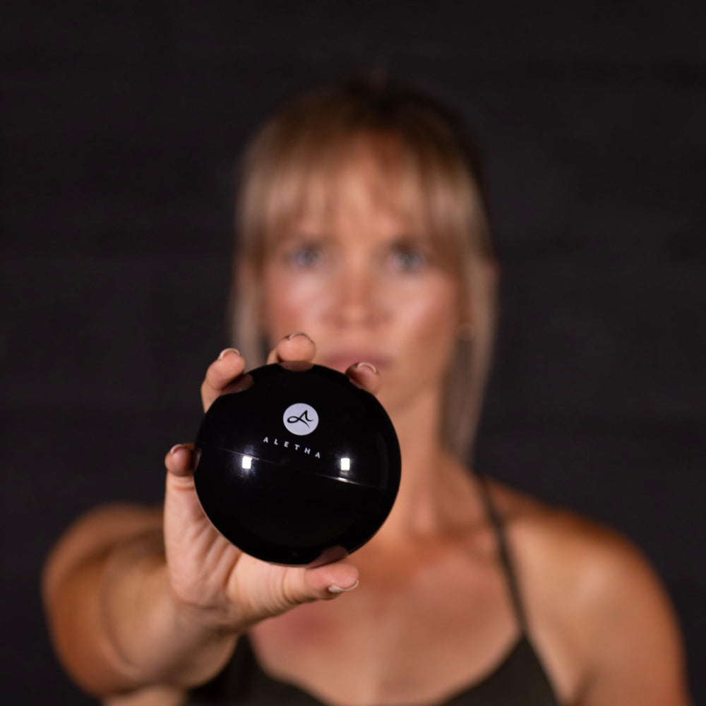 Aletha hip flexor release ball office-use setup for quick tension relief.