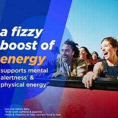 Fizzing Alka-Seltzer Energy Boost in a glass of water for refreshment and focus