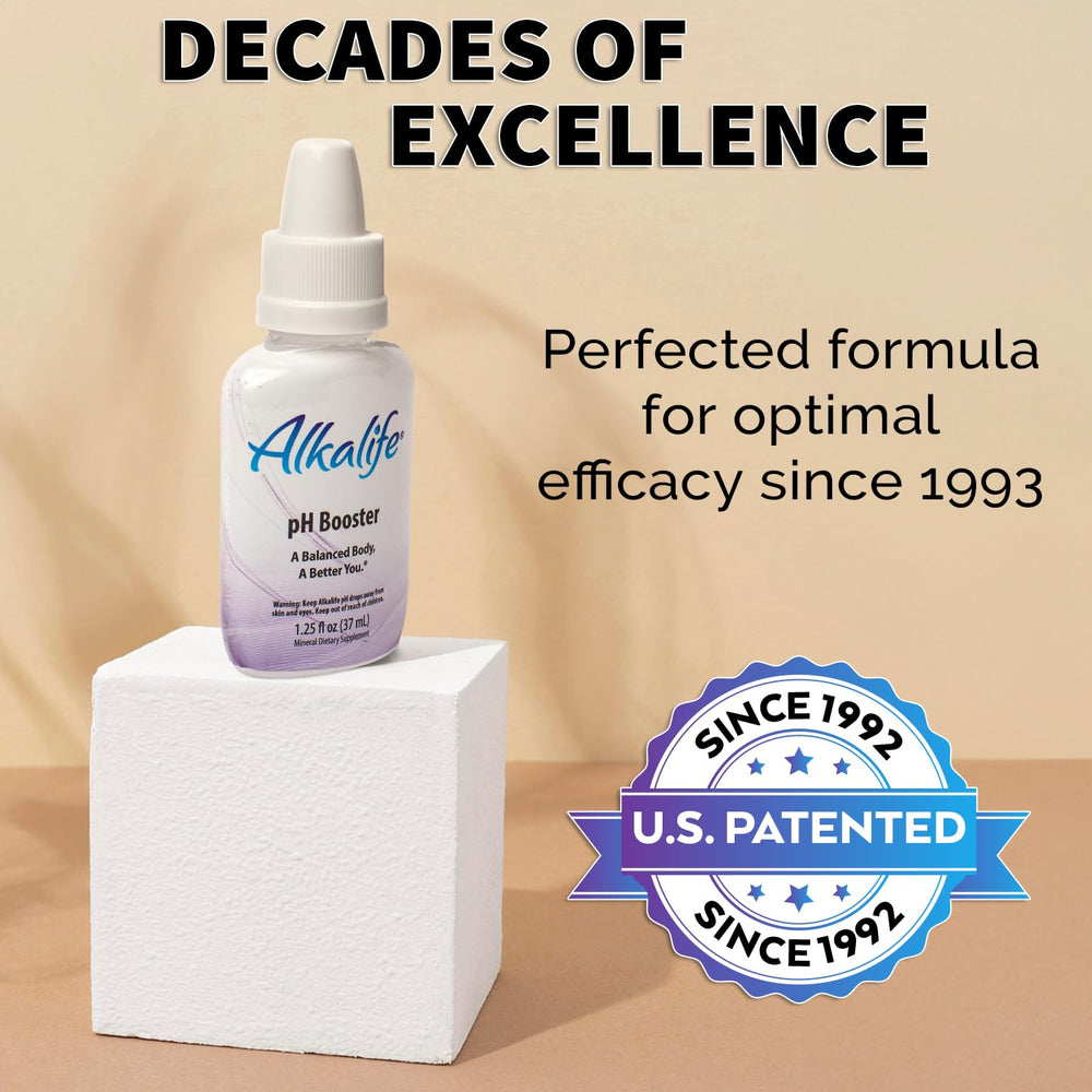 Pouring water from the Alkalife Drops bottle for pH-balanced hydration.