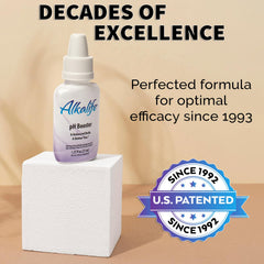 Pouring water from the Alkalife Drops bottle for pH-balanced hydration.