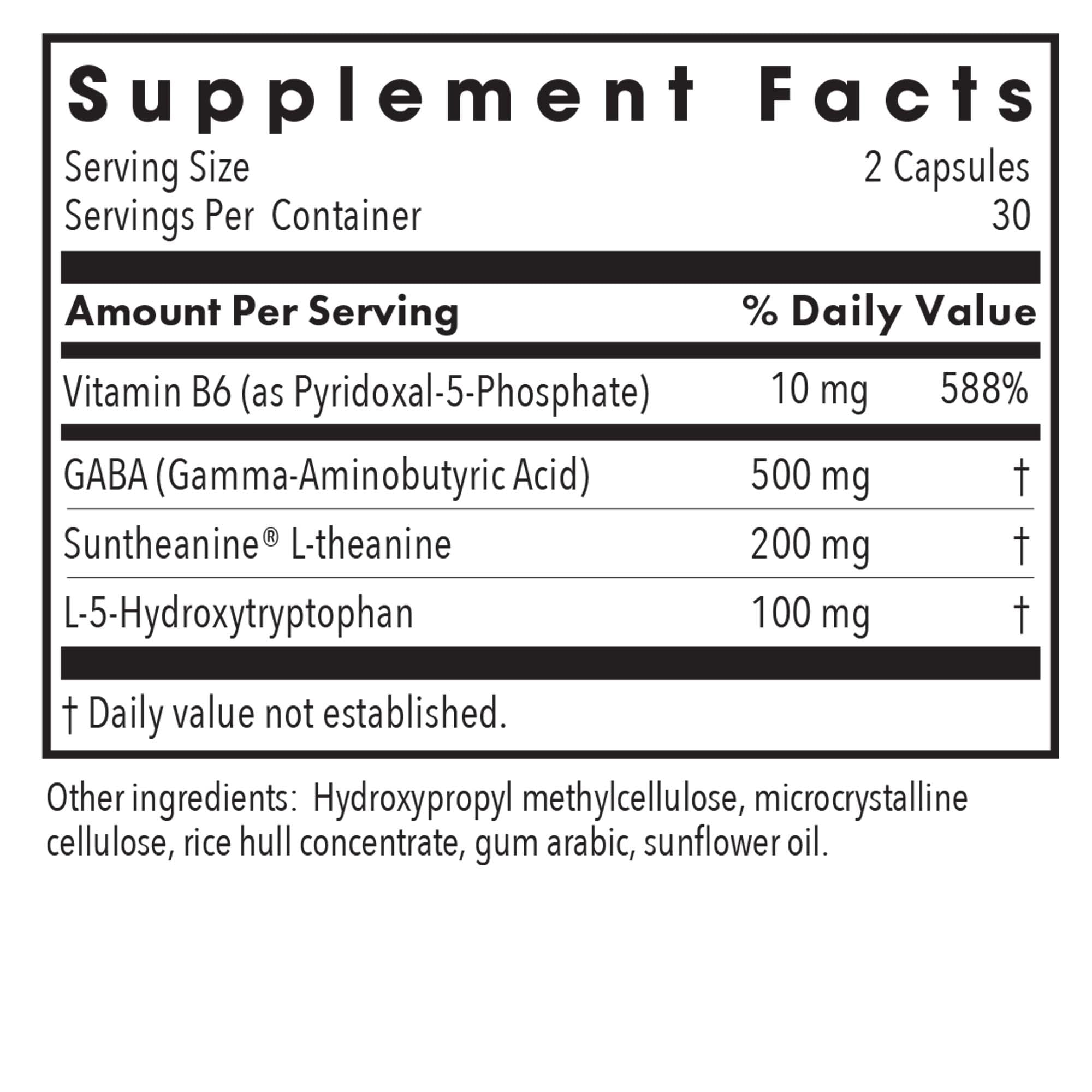 Allergy Research Group Zen Sleep two capsules on a nightstand ready for nightly use.